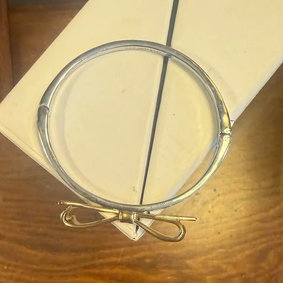 kate spade Love Notes Two-Tone Bow Bangle Hinged Bracelet - Silver and Gold - Picture 5 of 7